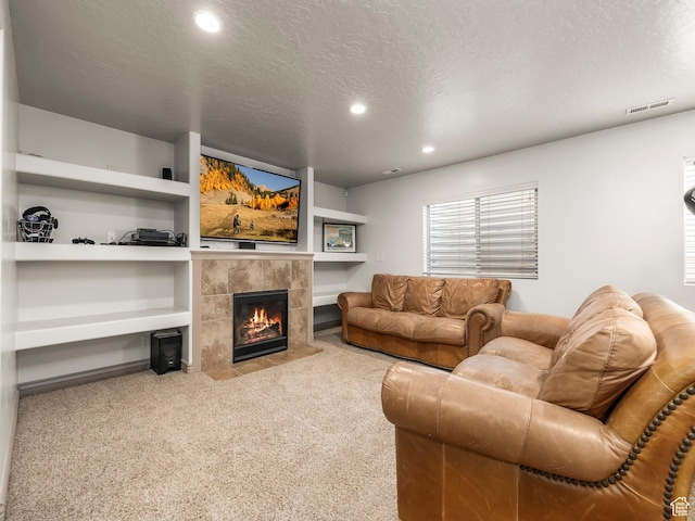 636 Quartz Dr, Santaquin, UT 84655 - carpeted living area featuring recessed lighting, a fireplace, and a textured ceiling