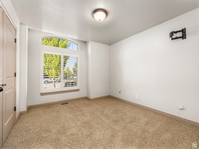 636 Quartz Dr, Santaquin, UT 84655 - empty room with carpet flooring, baseboards, and a textured ceiling