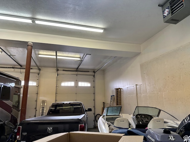 395 S 200 E, Willard, UT 84340 - garage featuring a heating unit and concrete block wall