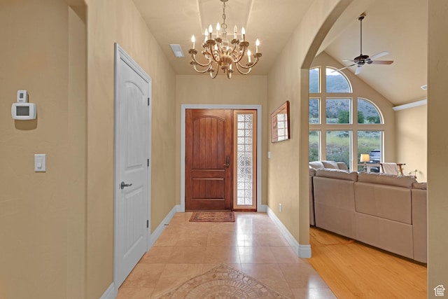 395 S 200 E, Willard, UT 84340 - foyer with baseboards, a chandelier, a ceiling fan, arched walkways, and high vaulted ceiling