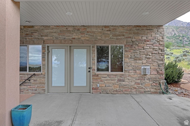 395 S 200 E, Willard, UT 84340 - doorway to property with stone siding and a patio