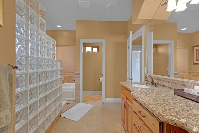 395 S 200 E, Willard, UT 84340 - bathroom with baseboards, vanity, and a bath