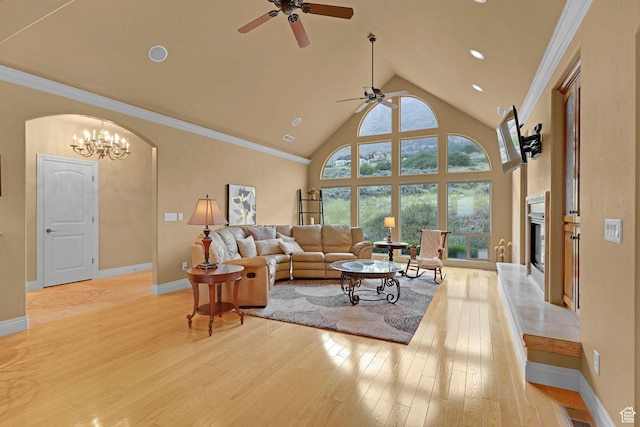 395 S 200 E, Willard, UT 84340 - living area with a ceiling fan, light wood finished floors, high vaulted ceiling, baseboards, and a fireplace