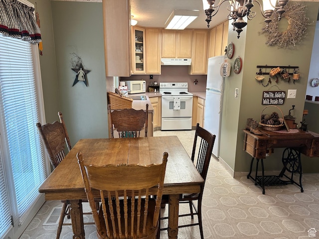2756 S 725 W, Perry, UT 84302 - dining area featuring a chandelier