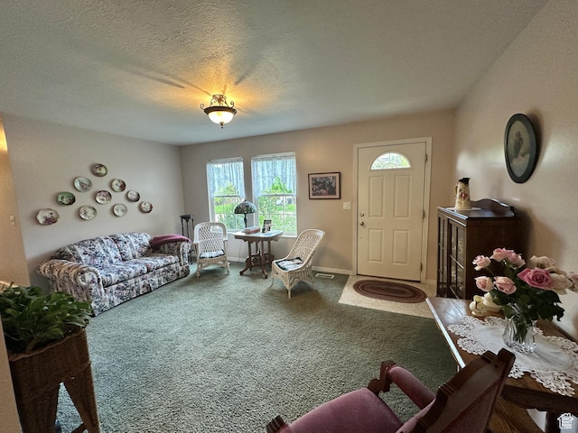 2756 S 725 W, Perry, UT 84302 - carpeted living area featuring a textured ceiling and baseboards