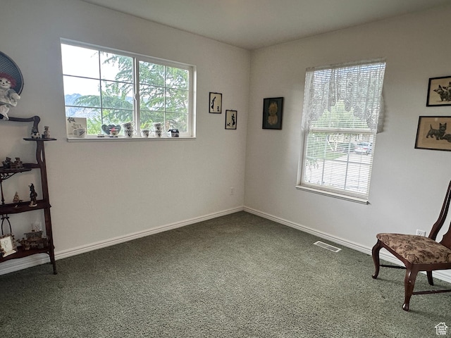 2756 S 725 W, Perry, UT 84302 - unfurnished room with dark colored carpet, plenty of natural light, and baseboards