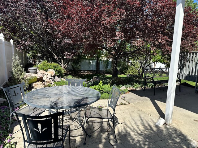 2756 S 725 W, Perry, UT 84302 - view of patio with outdoor dining space and a fenced backyard