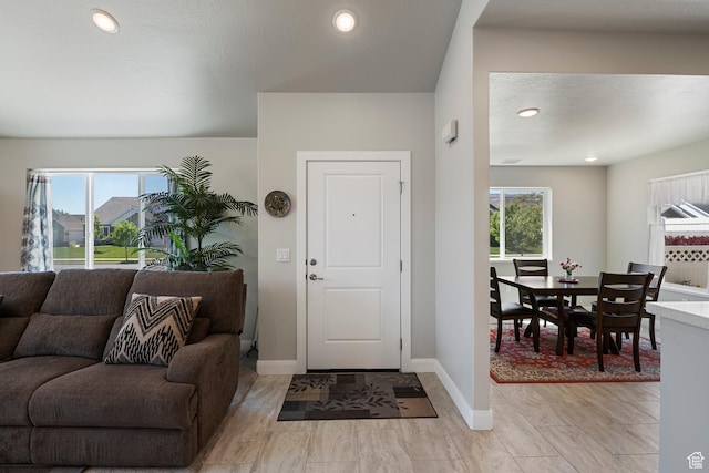 516 E Lone Star Ln Unit A, Saratoga Springs, UT 84045 - entryway featuring healthy amount of natural light, baseboards, and recessed lighting