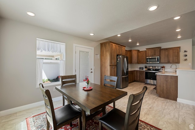 516 E Lone Star Ln Unit A, Saratoga Springs, UT 84045 - dining space with recessed lighting and baseboards