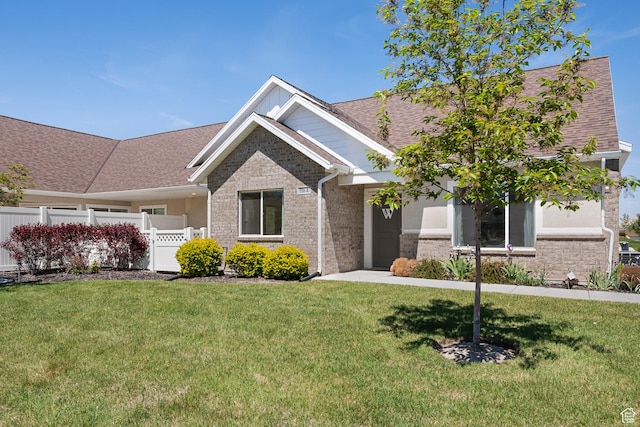 516 E Lone Star Ln Unit A, Saratoga Springs, UT 84045 - view of front of home with brick siding and roof with shingles