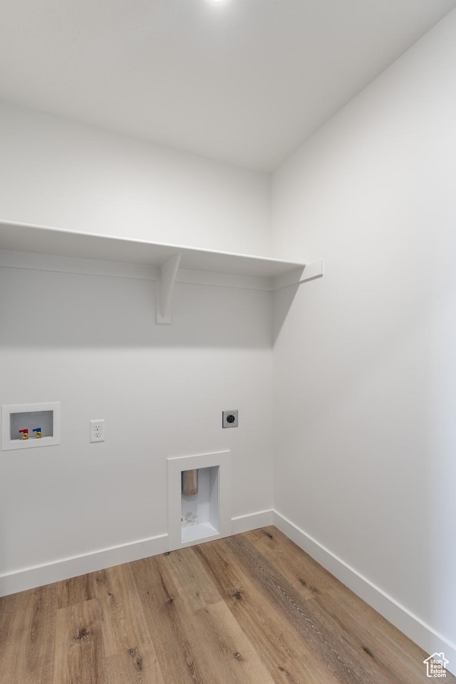 3148 N 2875 W Unit 29, Plain City, UT 84404 - laundry room with hookup for an electric dryer, washer hookup, wood finished floors, and baseboards