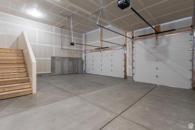 3148 N 2875 W Unit 29, Plain City, UT 84404 - garage featuring a garage door opener