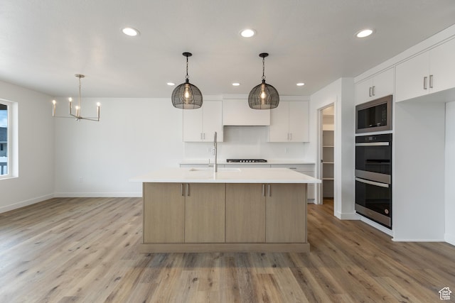 3148 N 2875 W Unit 29, Plain City, UT 84404 - kitchen with built in microwave, double wall oven, a sink, light wood-type flooring, and recessed lighting