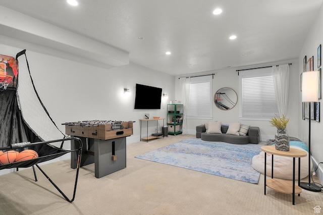 living room featuring recessed lighting, carpet flooring, and baseboards