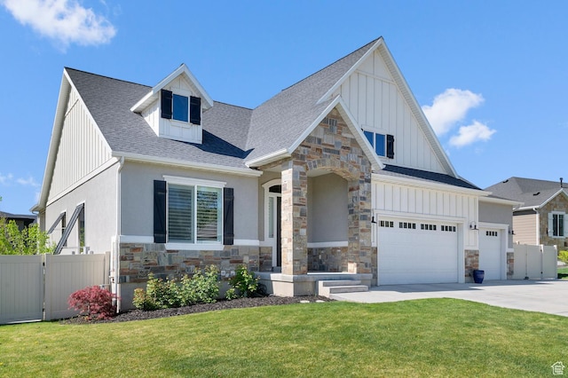 view of front of house featuring board and batten siding, stone siding, concrete driveway, a shingled roof, and a garage