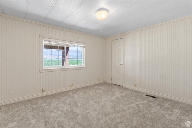 empty room featuring carpet floors