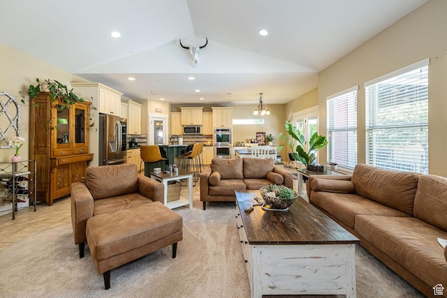 1608 W Boulder Creek Ln S, Layton, UT 84041 - living room featuring vaulted ceiling, light colored carpet, recessed lighting, and a chandelier