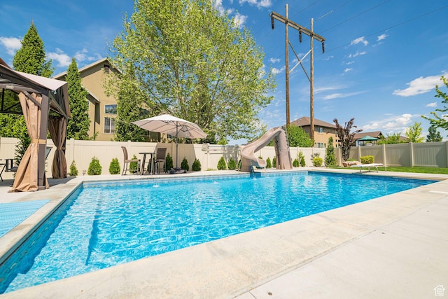 1608 W Boulder Creek Ln S, Layton, UT 84041 - view of swimming pool with a water slide, a fenced backyard, a gazebo, and a patio