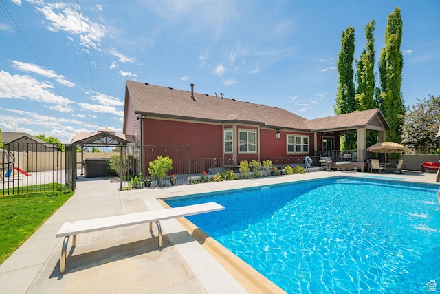 1608 W Boulder Creek Ln S, Layton, UT 84041 - view of pool featuring a patio area, a diving board, a gazebo, and fence