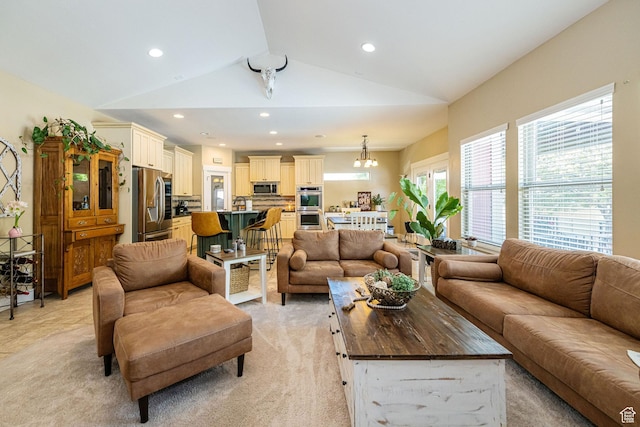1608 W Boulder Creek Ln S, Layton, UT 84041 - living room featuring lofted ceiling, recessed lighting, light colored carpet, and a chandelier