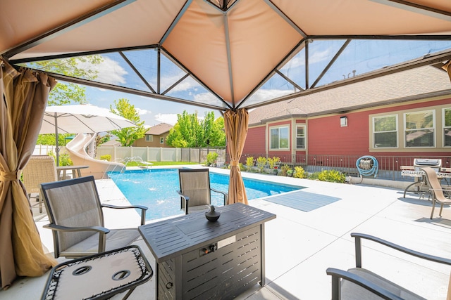 1608 W Boulder Creek Ln S, Layton, UT 84041 - view of swimming pool featuring a water slide, a patio area, and fence