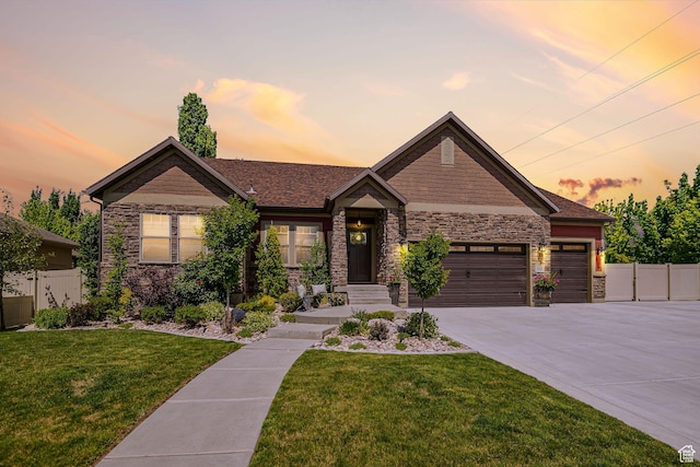 1608 W Boulder Creek Ln S, Layton, UT 84041 - craftsman house with stone siding, a garage, and driveway
