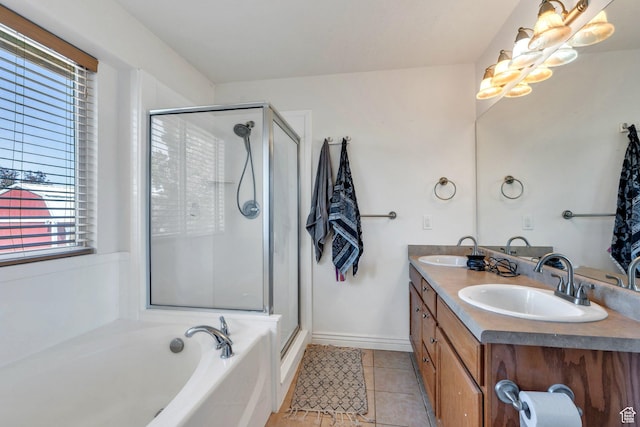 2177 N 130 W, Tooele, UT 84074 - full bathroom featuring tile patterned floors, a shower stall, a garden tub, and double vanity