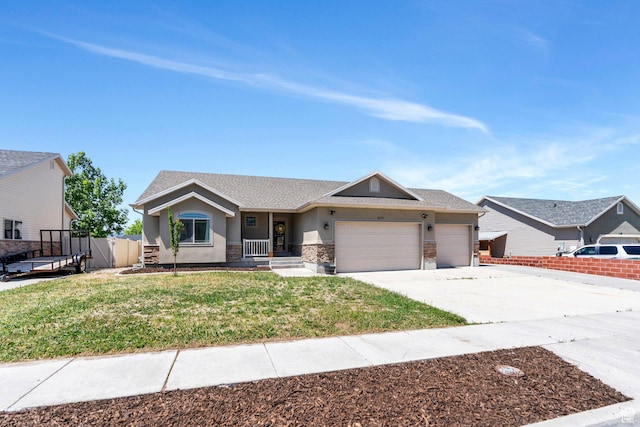 2177 N 130 W, Tooele, UT 84074 - ranch-style home with an attached garage, driveway, stucco siding, and stone siding