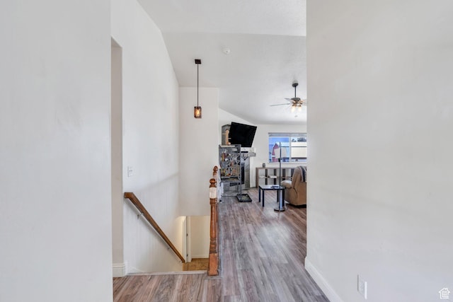 2177 N 130 W, Tooele, UT 84074 - hallway with an upstairs landing, wood finished floors, and baseboards
