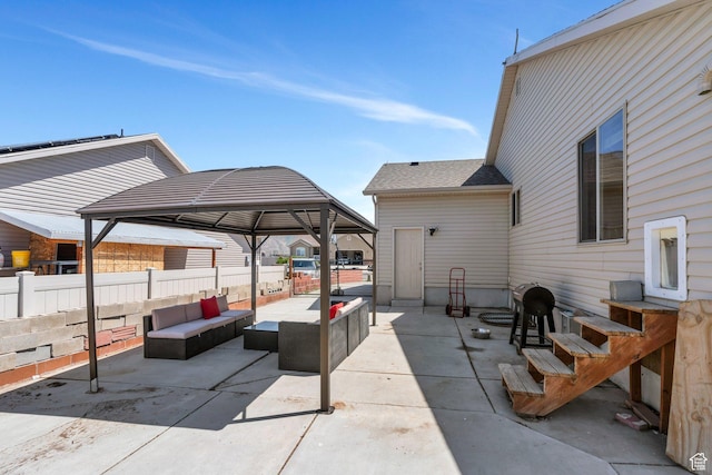 2177 N 130 W, Tooele, UT 84074 - view of patio with an outdoor living space, a gazebo, and fence