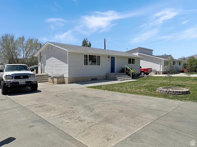 45 W 200 N, Castle Dale, UT 84513 - view of front of house featuring a front lawn and concrete driveway