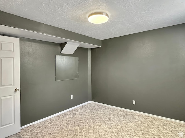 45 W 200 N, Castle Dale, UT 84513 - finished basement with a textured ceiling, baseboards, and carpet