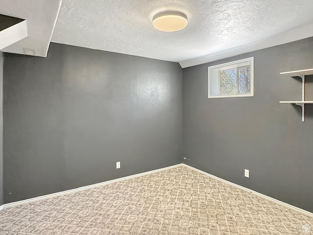 45 W 200 N, Castle Dale, UT 84513 - carpeted spare room featuring a textured ceiling and baseboards