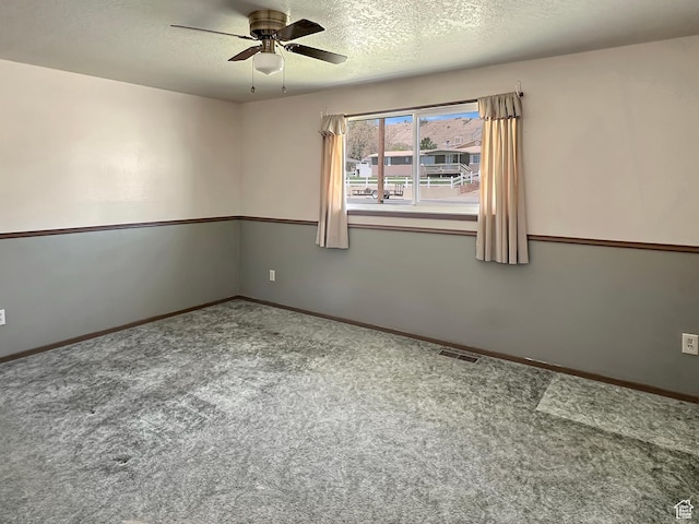 45 W 200 N, Castle Dale, UT 84513 - spare room with a ceiling fan, carpet flooring, a textured ceiling, and baseboards