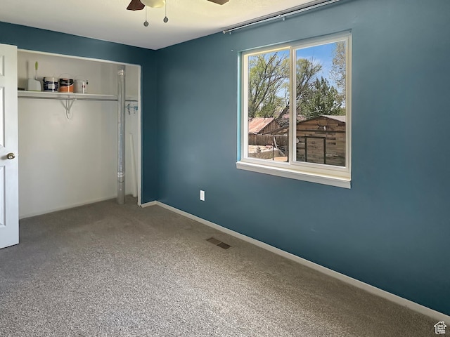 45 W 200 N, Castle Dale, UT 84513 - unfurnished bedroom with a closet, carpet floors, baseboards, and a ceiling fan