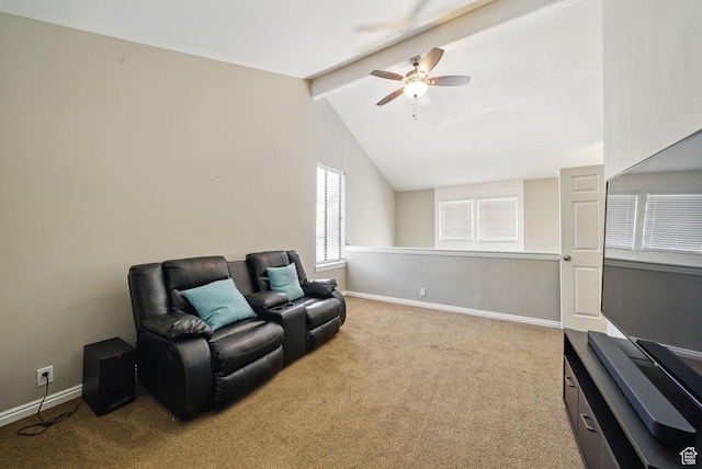 living area featuring ceiling fan, carpet floors, and baseboards