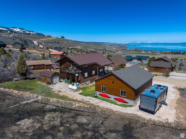 866 N Yarrow Cir Unit 38/39, Garden City, UT 84028 - aerial view of residential area featuring a mountainous background