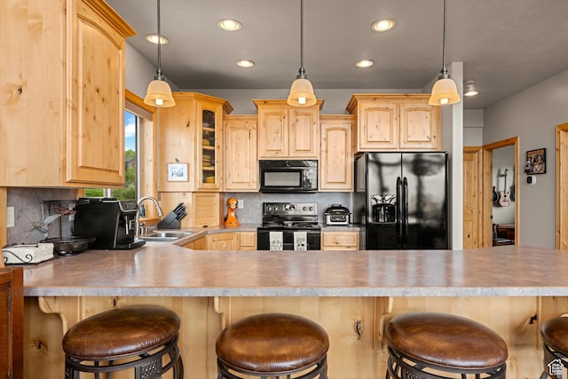 866 N Yarrow Cir Unit 38/39, Garden City, UT 84028 - kitchen featuring black appliances, light brown cabinetry, a sink, backsplash, and recessed lighting