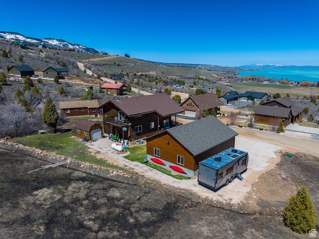 866 N Yarrow Cir Unit 38/39, Garden City, UT 84028 - aerial view of residential area featuring a water and mountain view