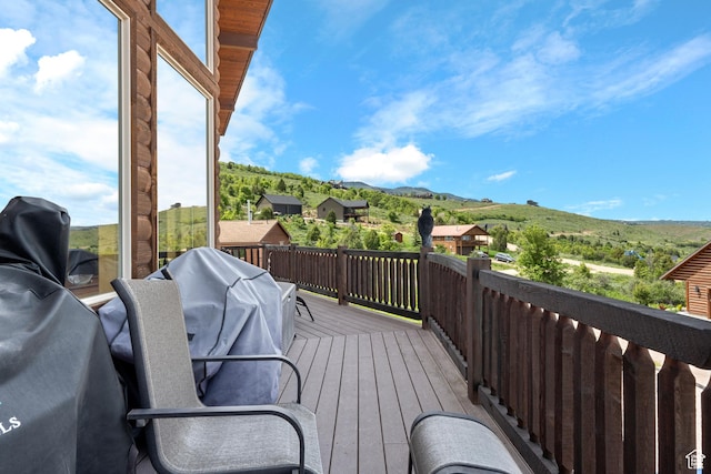 866 N Yarrow Cir Unit 38/39, Garden City, UT 84028 - wooden terrace featuring a mountain view
