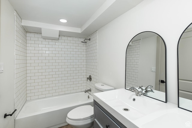 bathroom with toilet, washtub / shower combination, vanity, and recessed lighting