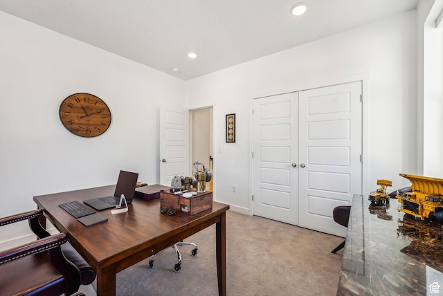 home office with light carpet and recessed lighting