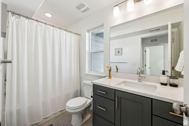 bathroom with toilet, vanity, tile patterned flooring, curtained shower, and recessed lighting