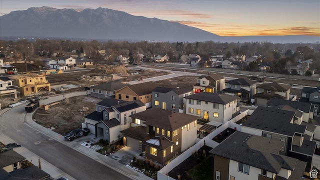 aerial perspective of suburban area with a mountain backdrop
