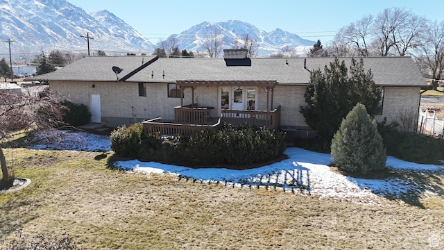 40 W 200 N, Santaquin, UT 84655 - back of property with brick siding, a deck with mountain view, roof with shingles, and a chimney
