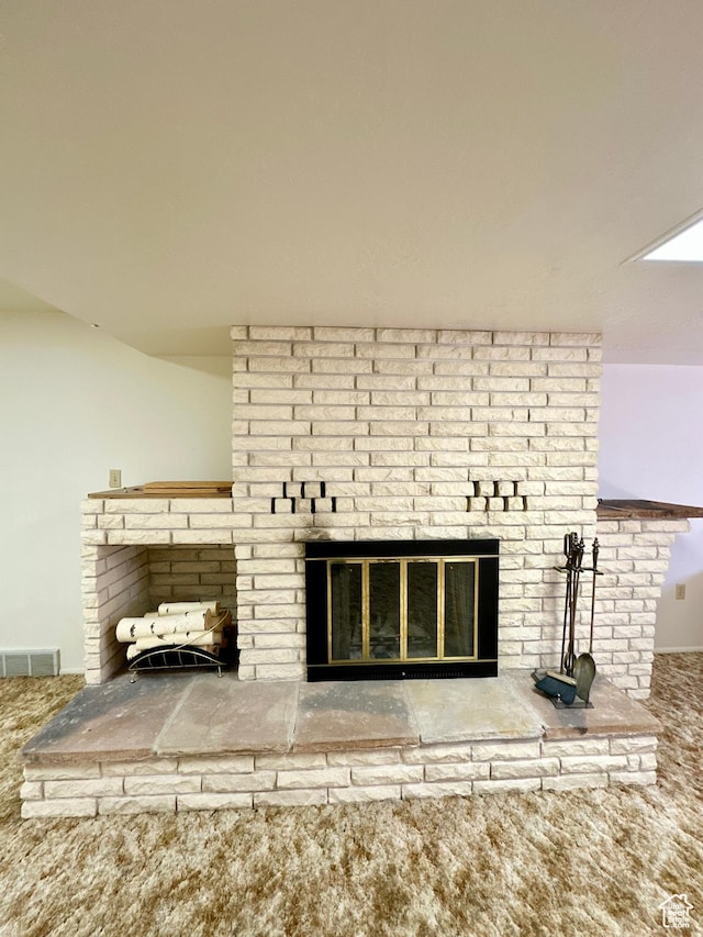40 W 200 N, Santaquin, UT 84655 - detailed view of a brick fireplace and carpet flooring