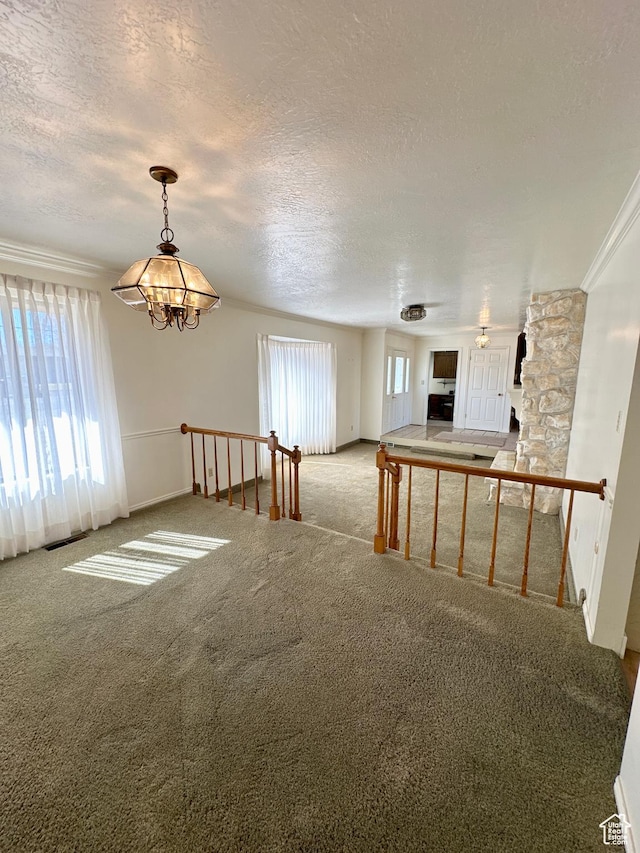 40 W 200 N, Santaquin, UT 84655 - spare room with a chandelier, a textured ceiling, and carpet flooring