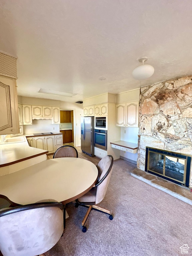 40 W 200 N, Santaquin, UT 84655 - dining area featuring carpet floors and a fireplace