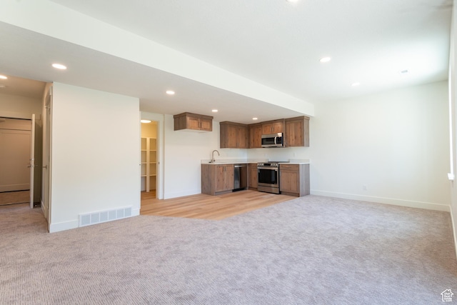 1699 N Siena Cir Unit 5, Pleasant Grove, UT 84062 - unfurnished living room with light carpet, recessed lighting, and wet bar