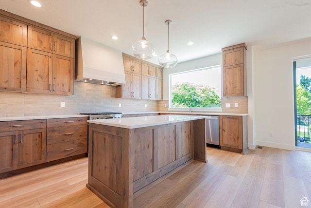 1699 N Siena Cir Unit 5, Pleasant Grove, UT 84062 - kitchen with custom exhaust hood, stainless steel dishwasher, light wood-style flooring, plenty of natural light, and recessed lighting